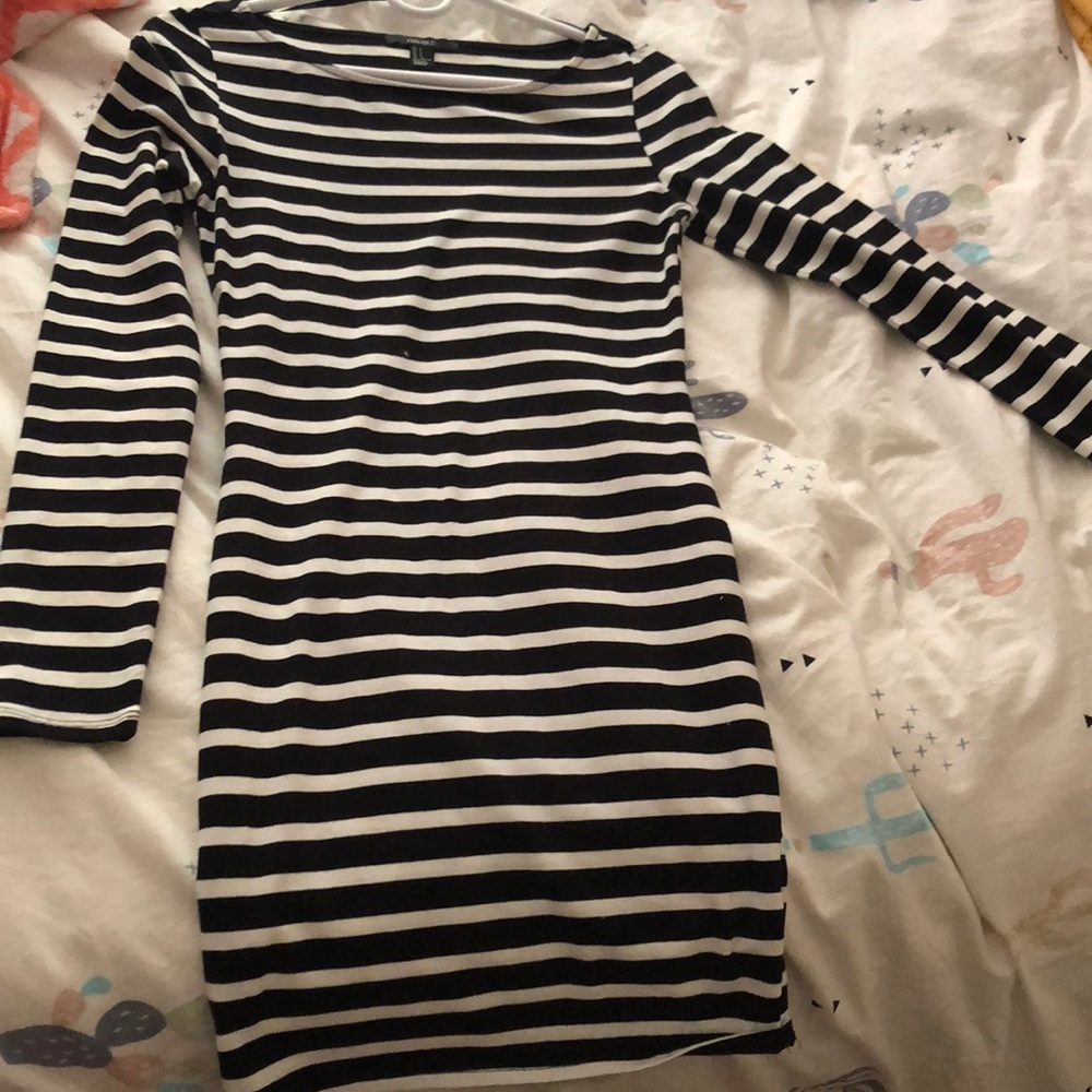 A black and white body con dress